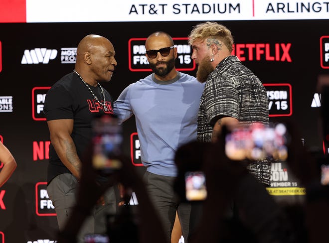 NEW YORK, NEW YORK - AUGUST 18: Mike Tyson and Jake Paul attend Fanatics Fest Press Conference at Javits Center on August 18, 2024 in New York City. (Photo by Michael Loccisano/Getty Images)