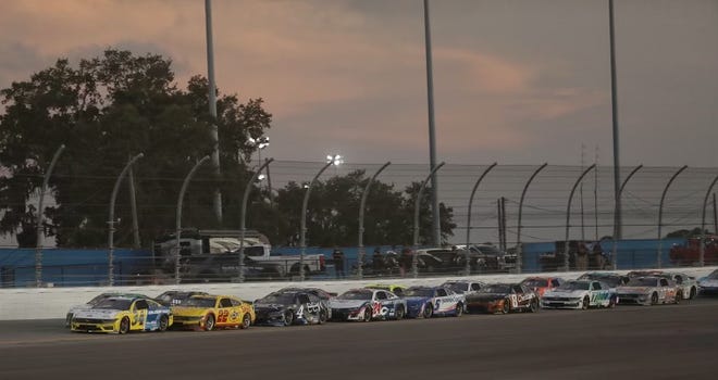 NASCAR Cup Series drivers race during the first stage of the Coke Zero Sugar 400, Saturday, Aug. 24, 2024, at Daytona International Speedway.