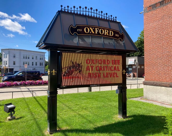 A sign outside Oxford Town Hall warns of the dangers of Eastern equine encephalitis Thursday.