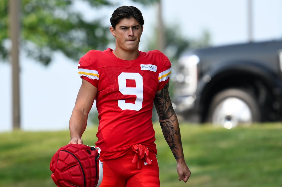 Kansas City Chiefs running back Louis Rees-Zammit walks to the field at the start of an NFL...