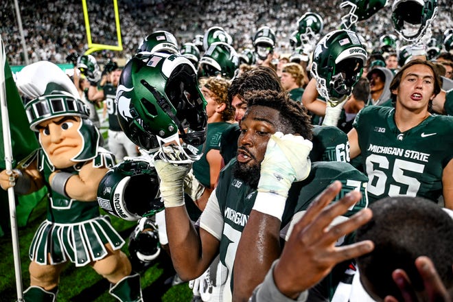 Michigan State celebrates after defeating Florida Atlantic on Friday, Aug. 30, 2024, at Spartan Stadium in East Lansing.