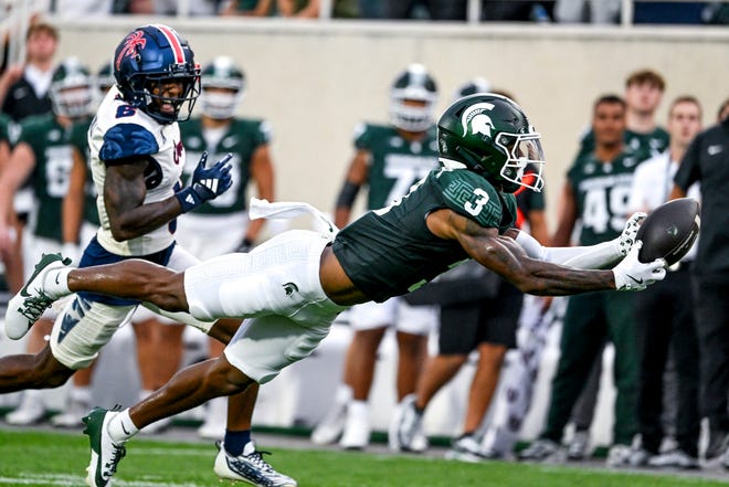 Michigan State's Montorie Foster Jr. just misses a catch against Florida Atlantic during the first quarter on Friday, Aug. 30, 2024, at Spartan Stadium in East Lansing.