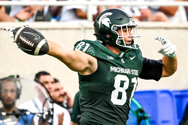 Michigan State's Michael Masunas celebrates a first down after a catch against Florida Atlantic during the first quarter on Friday, Aug. 30, 2024, at Spartan Stadium in East Lansing.