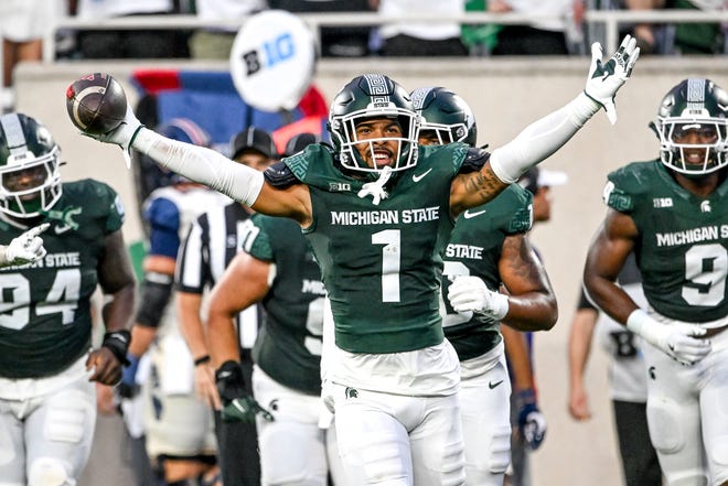 Michigan State's Nikai Martinez celebrates his interception against Florida Atlantic during the second quarter on Friday, Aug. 30, 2024, at Spartan Stadium in East Lansing.