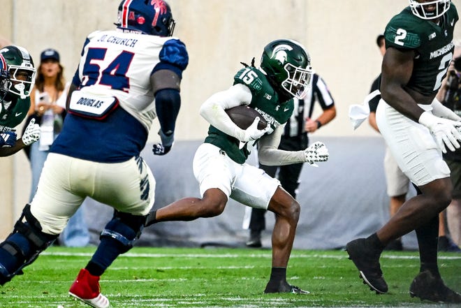 Michigan State's Angelo Grose returns an interception against Florida Atlantic during the second quarter on Friday, Aug. 30, 2024, at Spartan Stadium in East Lansing.