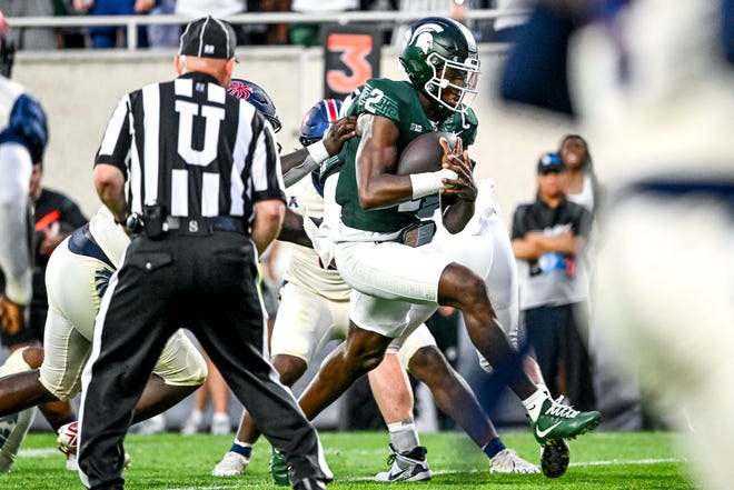 Michigan State's Aidan Chiles runs for a touchdown against Florida Atlantic during the second quarter on Friday, Aug. 30, 2024, at Spartan Stadium in East Lansing.