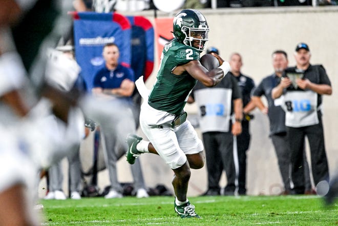 Michigan State's Aidan Chiles runs for a touchdown against Florida Atlantic during the second quarter on Friday, Aug. 30, 2024, at Spartan Stadium in East Lansing.