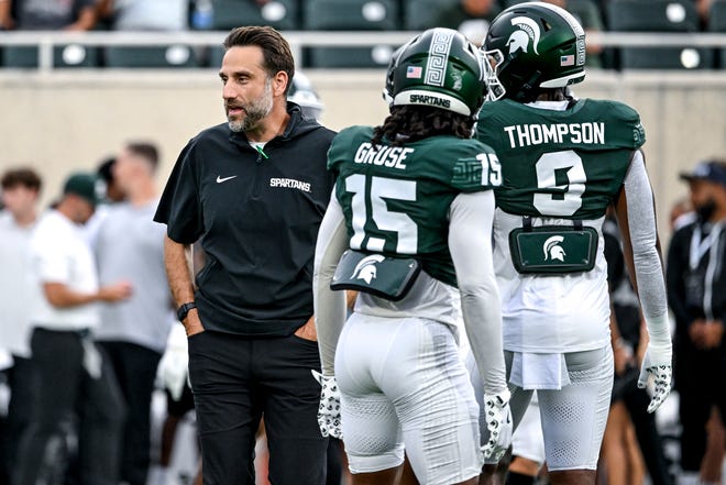 Michigan State's defensive coordinator Joe Rossi works with the team before the game against Florida Atlantic on Friday, Aug. 30, 2024, at Spartan Stadium in East Lansing.