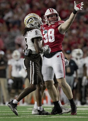 Wisconsin tight end Tucker Ashcraft (38) makes a reception for a first down during the first quarter of their game against Western Michigan Friday, August 30, 2024 at Camp Randall Stadium in Madison, Wisconsin.