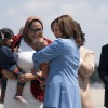 Vice President Harris holds the baby of Durham County Board of Commissioners chair Nida Allam upon arrival at Raleigh-Durham International Airport in North Carolina on Aug. 16, 2024.