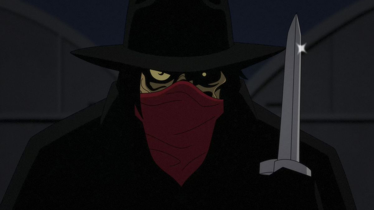 A mysterious man, possibly Clayface, whose grotesque visage is hidden by a hat and bandanna, holds a knife up in a shot from the animated series Batman: Caped Crusader