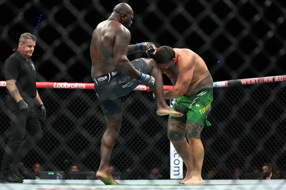 PERTH, AUSTRALIA - AUGUST 18: Jairzinho Rozenstruik of Suriname fights Tai Tuivasa of Australia in the Heavyweight Bout during UFC 305 at RAC Arena on August 18, 2024 in Perth, Australia. (Photo by Paul Kane/Getty Images)