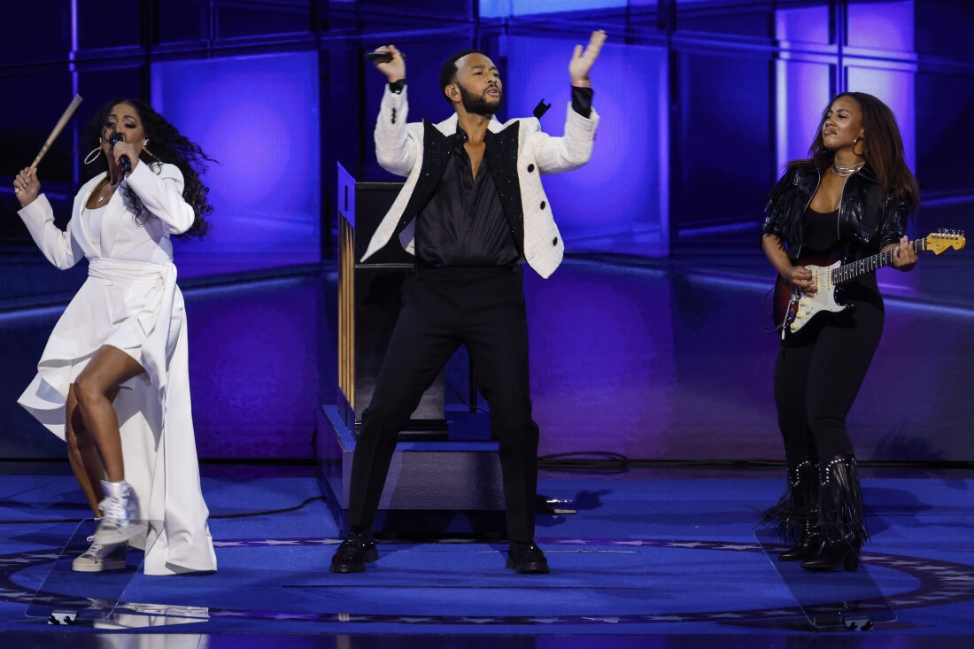 Musicians John Legend, Ari O'Neal and Sheila E. perform on stage during the third day of the Democratic National Convention in Chicago, Illinois.