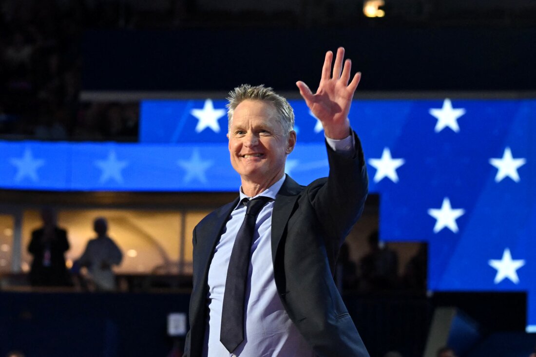 Golden State Warriors and Team USA head coach Steve Kerr walks on stage to speak on the first day of the Democratic National Convention in Chicago, Illinois, on August 19, 2024. 