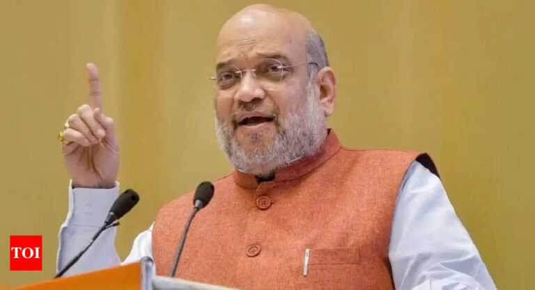 Risking-nations-unity-Amit-Shah-attacks-Congress-over-tie-up-with.jpg