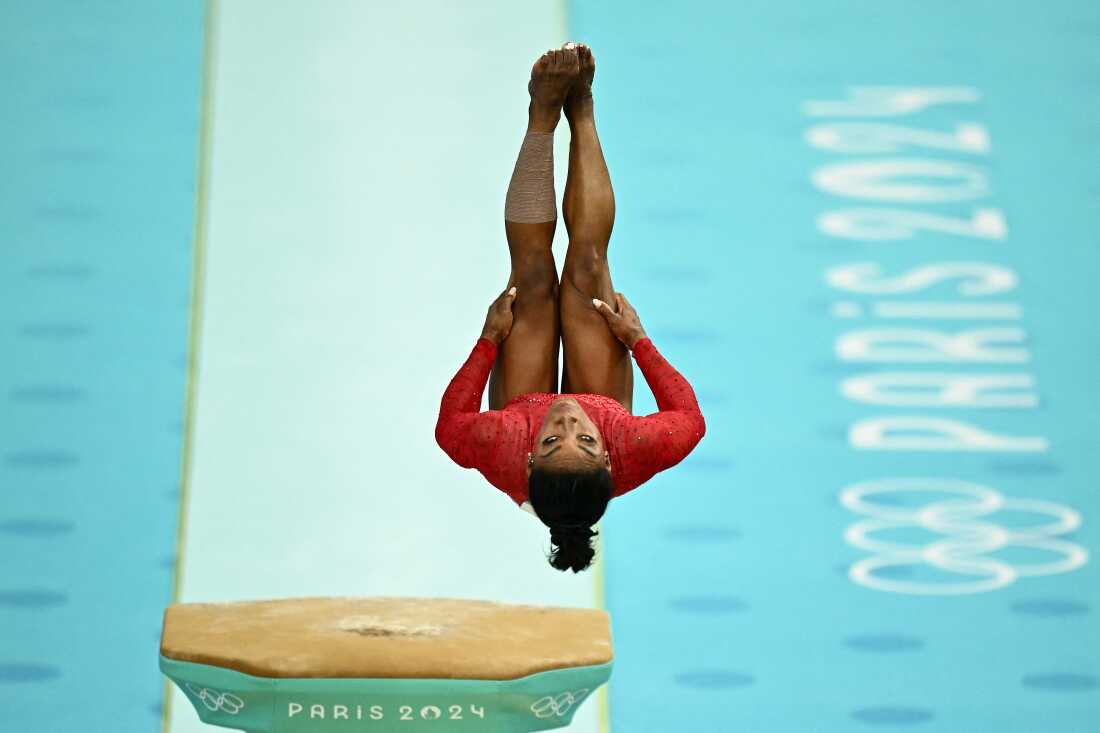 Simone Biles performs her signature 'Yurchenko double pike' to win gold in the gymnastics women's vault final during the Paris 2024 Olympic Games on Saturday at Bercy Arena.