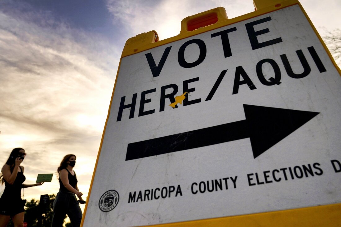 Voters walk to a polling station in Tempe, Ariz., in November 2020.