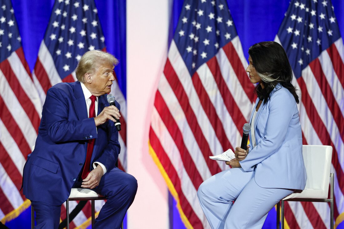 Former President and Republican presidential candidate Donald Trump (L) speaks during a town hall meeting moderated by former Rep. Tulsi Gabbard at La Crosse Center in La Crosse, Wisc., on Aug. 29, 2024. 