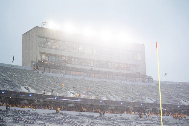 Steady rain falls on Milan Puskar Stadium during a weather delay between Penn State and West Virginia, Saturday, August 31, 2024, in Morgantown, W. Va.