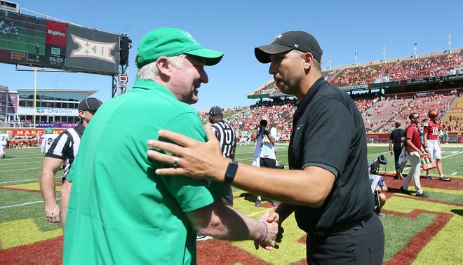 Iowa State Cyclones football head coach Matt Campbell greets South Dakota football head coach Bubba Schweigert before the season opening NCAA game at Jack Trice Stadium on Aug. 31, 2024,  in Ames, Iowa