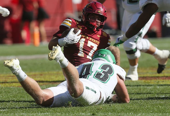 Iowa State Cyclones defensive back Beau Freyler (17) gets tackle by North Dakota Fighting Hawks tight end Jaden Norby (43) after an interception during the third quarter in the season opening game at Jack Trice Stadium on Aug. 31, 2024,  in Ames, Iowa