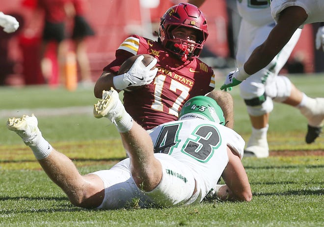 Iowa State Cyclones defensive back Beau Freyler (17) gets tackle by North Dakota Fighting Hawks tight end Jaden Norby (43) after an interception during the third quarter in the season opening game at Jack Trice Stadium on Aug. 31, 2024,  in Ames, Iowa