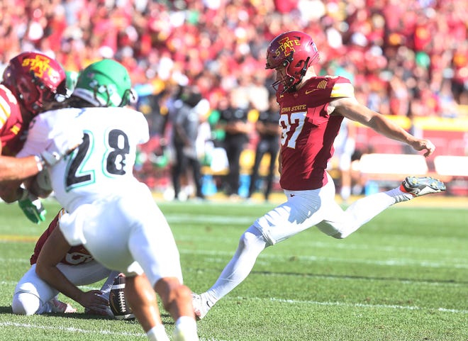 Iowa State Cyclones kicker Kyle Konrardy (97) kicks the ball for an extra point during the fourth quarter in the season opening game at Jack Trice Stadium on Aug. 31, 2024,  in Ames, Iowa