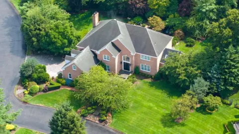 Getty Images Aerial view of Linda Sun and Christopher Hu's home in Long Island, New York