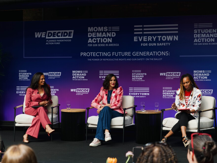 Michigan Governor Gretchen Whitmer (center) and Mom’s Demand Director Angela Ferrell-Zabala (right) speak during the panel at the "Protecting Future Generations" forum.