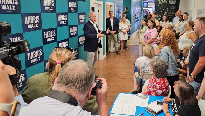 Democratic Vice Presidential candidate Tim Walz addresses volunteers at the Harris-Walz field office in Erie, Pa. on Sept. 5, 2024.