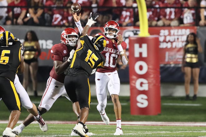 Aug 29, 2024; Little Rock, Arkansas, USA; Arkansas Razorbacks quarterback Taylen Green (10) passes in the second quarter against the Pine Bluff Golden Lions at War Memorial Stadium.