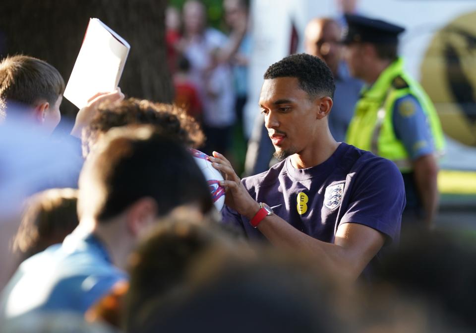 Trent Alexander-Arnold signs autographs for fans as the players arrive at Carlton House, County Kildare. (Brian Lawless/PA Wire)