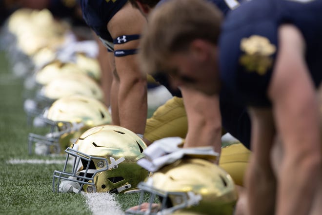 Notre Dame warms up before a NCAA college football game between Notre Dame and Northern Illinois at Notre Dame Stadium on Saturday, Sept. 7, 2024, in South Bend.