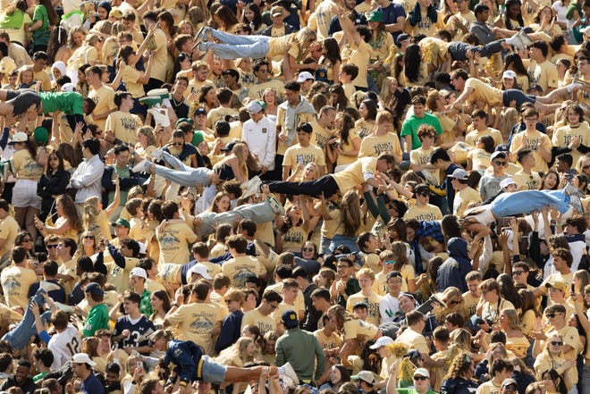 Notre Dame fans are lifted up after a Notre Dame touchdown during a NCAA college football game between Notre Dame and Northern Illinois at Notre Dame Stadium on Saturday, Sept. 7, 2024, in South Bend.