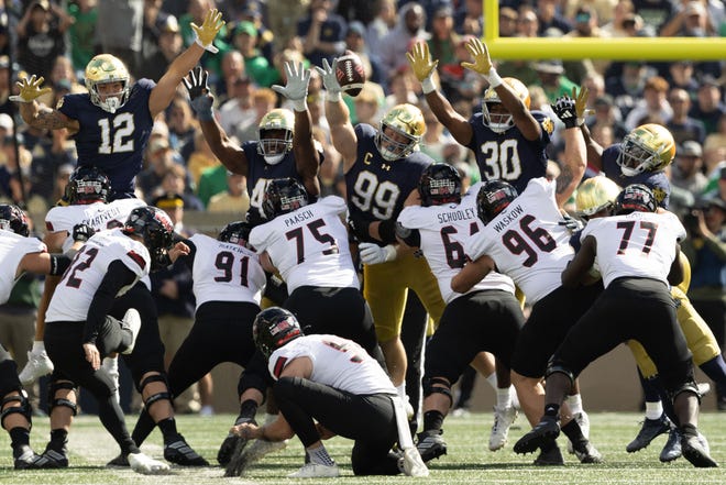 Notre Dame's defense attempts to block a Northern Illinois field goal during a NCAA college football game between Notre Dame and Northern Illinois at Notre Dame Stadium on Saturday, Sept. 7, 2024, in South Bend.