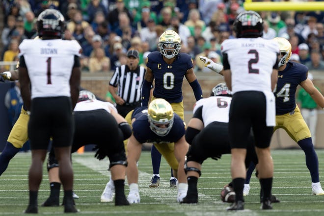 Notre Dame safety Xavier Watts (0) waits for the snao during a NCAA college football game between Notre Dame and Northern Illinois at Notre Dame Stadium on Saturday, Sept. 7, 2024, in South Bend.