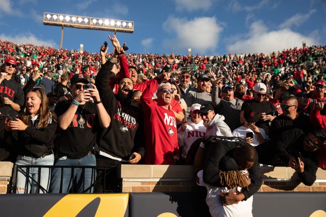 Northern Illinois fans celebrate after wining a NCAA college football game 16-14 against Notre Dame at Notre Dame Stadium on Saturday, Sept. 7, 2024, in South Bend.