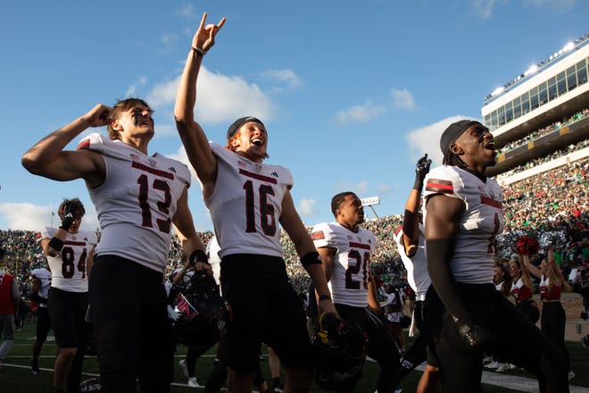 Northern Illinois celebrates after wining a NCAA college football game 16-14 against Notre Dame at Notre Dame Stadium on Saturday, Sept. 7, 2024, in South Bend.