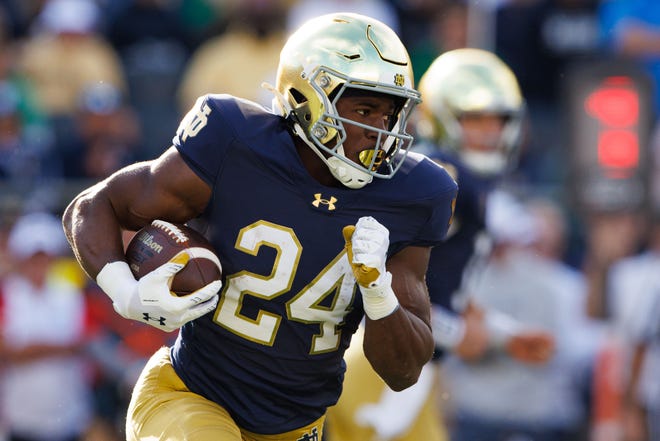 Notre Dame running back Jadarian Price runs the ball up the field during a NCAA college football game between Notre Dame and Northern Illinois at Notre Dame Stadium on Saturday, Sept. 7, 2024, in South Bend.