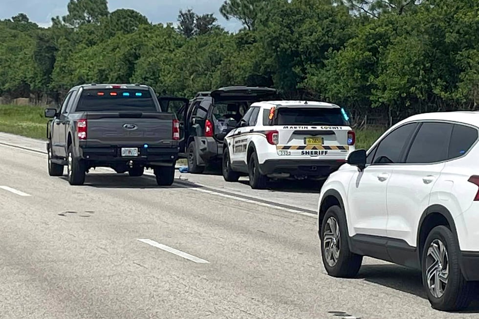 This photo provided by the Martin County Sheriff's Office shows Sheriff's vehicles surrounding...