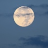 The sturgeon supermoon sets in Las Vegas on Aug. 2, 2023.