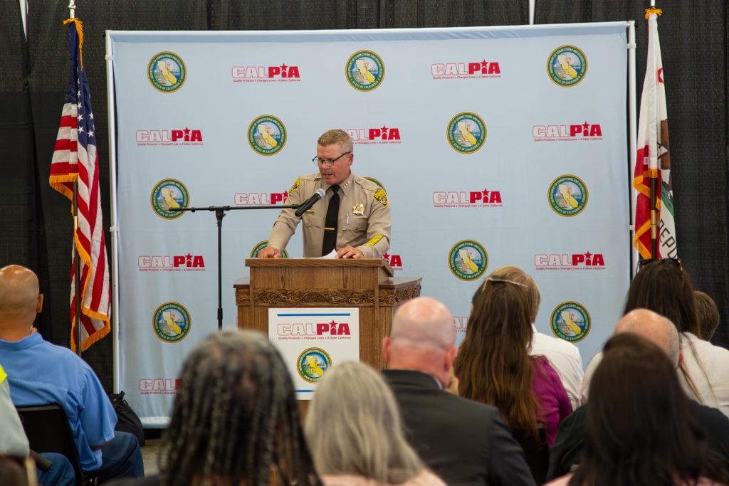 Chief deputy warden at Mule Creek State Prison speaks to the CALPIA graduates.