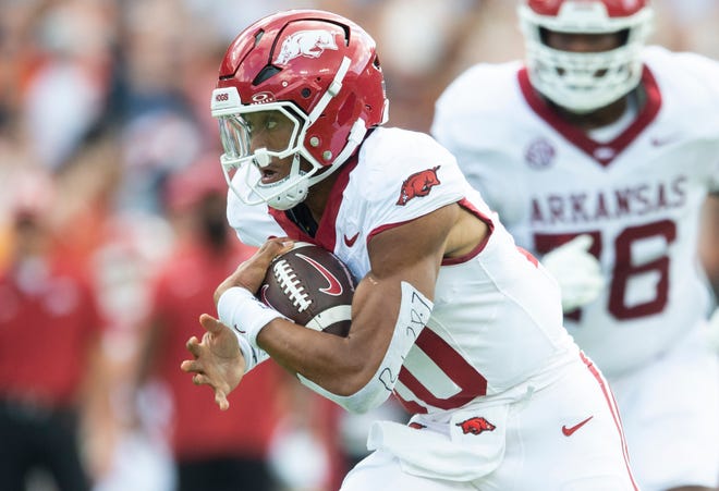 Arkansas Razorbacks quarterback Taylen Green (10) runs the ball as Auburn Tigers take on Arkansas Razorbacks at Jordan-Hare Stadium in Auburn, Ala., on Saturday, Sept. 21, 2024. Arkansas Razorbacks lead Auburn Tigers 7-0 at halftime.