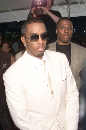 Thalia Graves filed a lawsuit against Sean "Diddy" Combs, pictured, on Tuesday, alleging the embattled hip-hop mogul raped her in 2001 alongside his bodyguard.