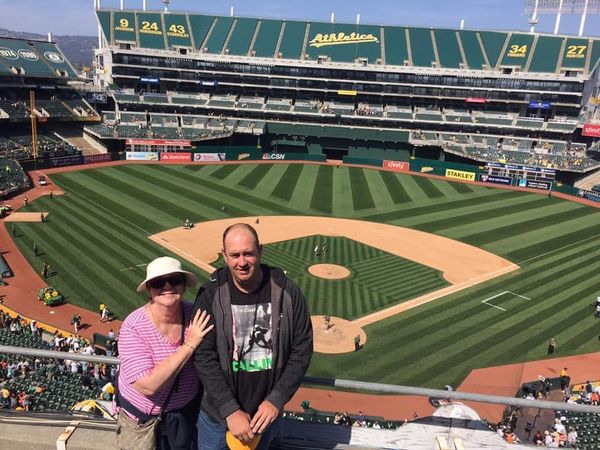 The author and his mom watch a game at the Coliseum circa 2016. (Thomas Gase - Times-Herald)