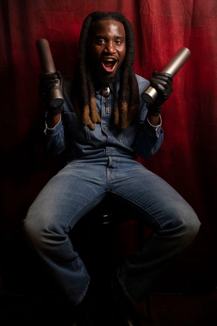 Shaboozey sits with his two People’s Choice Awards at The Grand Ole Opry in Nashville , Tenn., Thursday, Sept. 26, 2024.