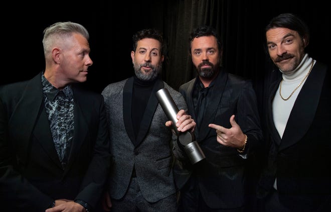 Old Dominion stands with their People’s Choice Award at The Grand Ole Opry in Nashville , Tenn., Thursday, Sept. 26, 2024.