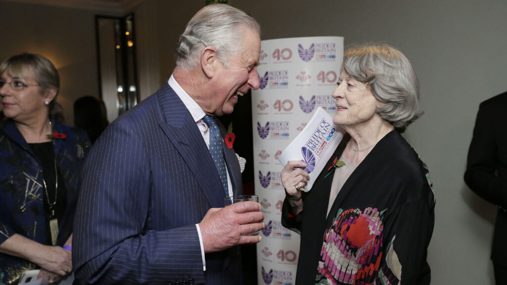 Color photo of the then Prince of Wales speaking with Dame Maggie Smith at the Prince’s Trust reception at the 2016 Daily Mirror Pride of Britain Awards.