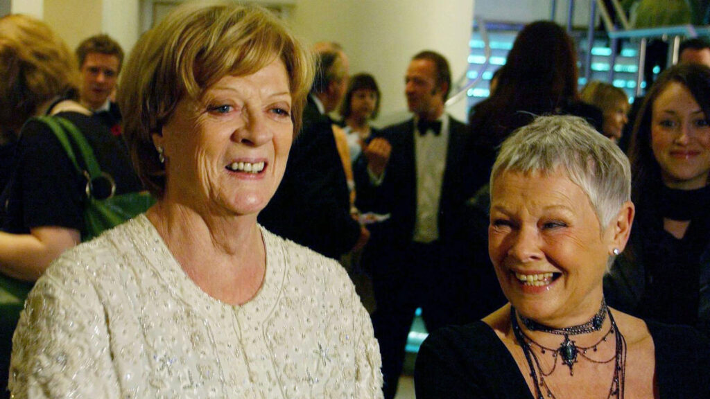 Dame Maggie Smith (left) and Dame Judi Dench arrive for a screening of Ladies in Lavender at the Odeon Leicester Square London, 2004.