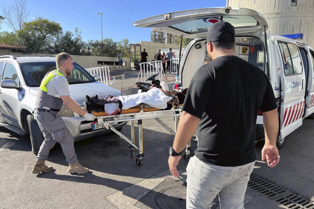 Civil Defense first-responders carry a wounded man whose handheld pager exploded at al-Zahraa hospital in Beirut, Lebanon, Tuesday, Sep. 17, 2024.